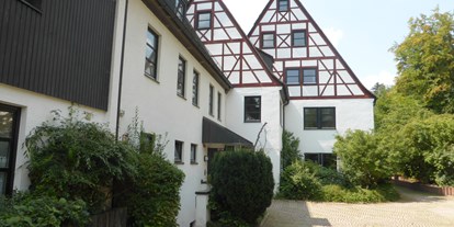 Monteurwohnung - Badezimmer: Gemeinschaftsbad - Außenbereich Campus Prackenfels - Campus Prackenfels