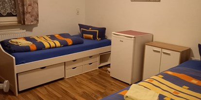 Monteurwohnung - PLZ 76149 (Deutschland) - saubere Zimmer mit eigenem Minibarkühlshrank - Gut gelegene Monteurunterkunft direkt an der A65 zwischen Karlsruhe und Landau