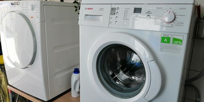 Monteurwohnung - Lauchheim - Waschmaschinen und Trockner im Waschraum - Haag Ferienwohnungen