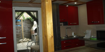 Monteurwohnung - Zimmertyp: Einzelzimmer - Hessen Süd - Küche mit direktem Zugang zum Garten - Monteurwohnung Groß-Gerau