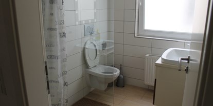 Monteurwohnung - Badezimmer: Gemeinschaftsbad - Stuttgart - Wohlfühlen in unserem Bad - Millenium Boarding House