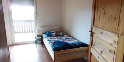 Monteurwohnung - WLAN - Ulm - Schlafzimmer, HomeRent Unterkunft in Laichingen - HomeRent in Laichingen, Hohenstadt, Feldstetten