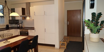 Monteurwohnung - WLAN - Bremen - Küche und Essbereich - Entspannte Auszeit in Bremerhaven - perfekt gelegen & gut ausgestattet für 4 Personen