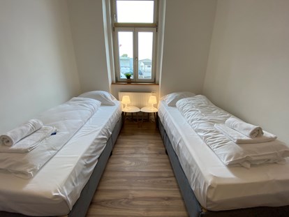 Monteurwohnung - Bettwäsche: Bettwäsche inklusive - Österreich - Schlafzimmer inkl. Handtücher und Bettwäsche - Monteurwohnungen in Klagenfurt am Wörthersee