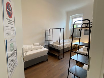 Monteurwohnung - Zimmertyp: Mehrbettzimmer - Schlafzimmer für drei Personen - Monteurwohnungen in Klagenfurt am Wörthersee