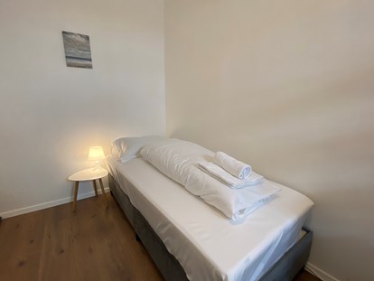 Monteurwohnung - Zimmertyp: Mehrbettzimmer - Boxspringbetten - Monteurwohnungen in Klagenfurt am Wörthersee