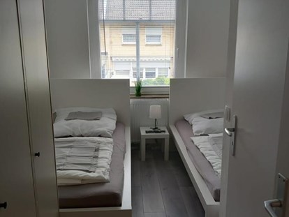 Monteurwohnung - Badezimmer: Gemeinschaftsbad - Betten beispielhaft - Zentral gelegen, gut ausgestattete Mitarbeiterunterkünfte