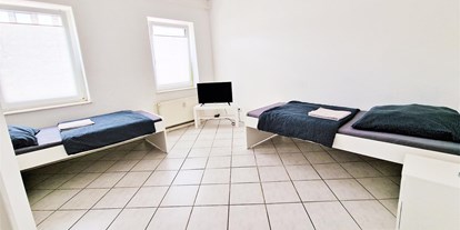 Monteurwohnung - Nordrhein-Westfalen - Schlafzimmer, HomeRent Unterkunft in Düren - HomeRent in Düren