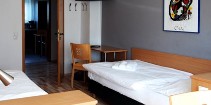 Monteurwohnung - Einzelbetten - Region Schwaben - Zweibettzimmer mit Balkon - Monteurwohnung Ulm Seligweiler