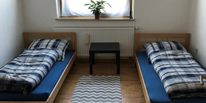 Monteurwohnung - Köln - Schlafzimmer 1 - Palms Zimmer
