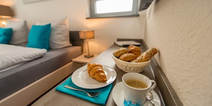Monteurwohnung - Zimmertyp: Mehrbettzimmer - Hessen Süd - Kaffee und Tee, Bäcker und Supermarkt um die Ecke. - Apartmenthaus & Ferienwohnungen Horster
