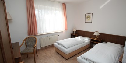 Monteurwohnung - Frühstück - Doppelzimmer mit getrennten Betten - Landhotel Heidepark
