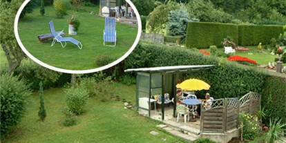 Monteurwohnung - Art der Unterkunft: Ferienwohnung - Niedersachsen - Der Garten mit Platz zum Grillen - Haus Templin in Osterode am Harz