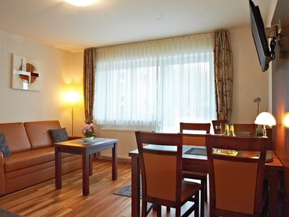 Monteurwohnung - Zimmertyp: Einzelzimmer - Deutschland - Ferienwohnung, Wohnbereich. - Hotel Wendelstein GmbH