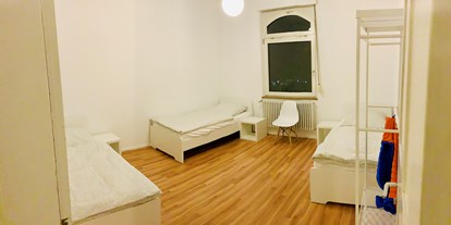 Monteurwohnung - TV - Stuttgart - Schlafzimmer mit Einzelbetten - raumstuttgart