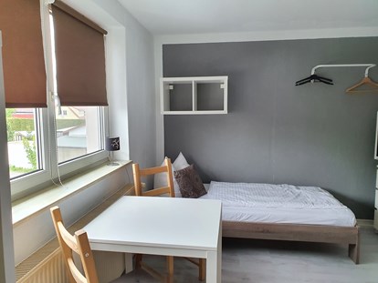 Monteurwohnung - Einzelbetten - 1 DZ 1. OG - Ferienhaus- und Zimmervermietung Petra Hähnel