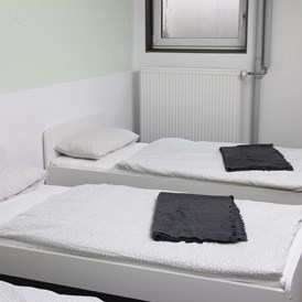 Monteurzimmer: Schlafraum - Moderne Unterkunft im Herzen von Germering/München