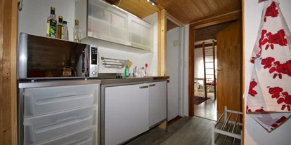 Monteurwohnung - WLAN - Götighofen - Küche - Rustikales Zimmer