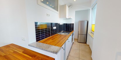 Monteurwohnung - Kühlschrank - Wels (Wels) - Essplatz mit Küche - Apartement auf Zeit