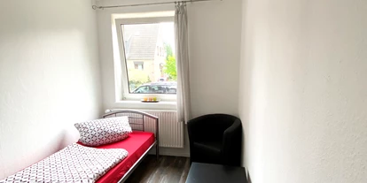 Monteurwohnung - Einzelbetten - PLZ 27809 (Deutschland) - Ansicht Zimmer 1 - Ideal für Monteure und beruflich Reisende