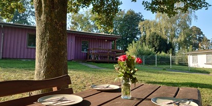 Monteurwohnung - Küche: eigene Küche - Lalendorf OT Friedrichshagen - Außenbereich - Oase am See Heimat Bungalows