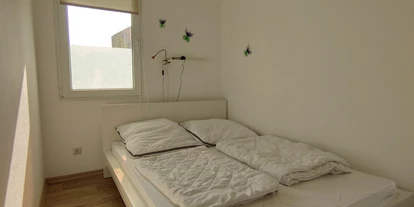 Monteurwohnung - Zimmertyp: Doppelzimmer - Alt Sührkow - Schlafzimmer - Oase am See Heimat Bungalows