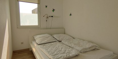 Monteurwohnung - Küche: eigene Küche - Vorpommern - Schlafzimmer - Oase am See Heimat Bungalows