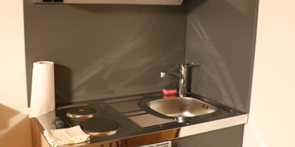 Monteurwohnung - Küche: eigene Küche - Sbg. Salzkammergut - Gasthof Gruber Zimmer 2