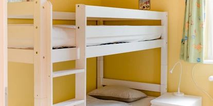 Monteurwohnung - Kühlschrank - Liezen - Kleines Schlafzimmer mit Etagenbett - Ferienwohnung Mountain View 1