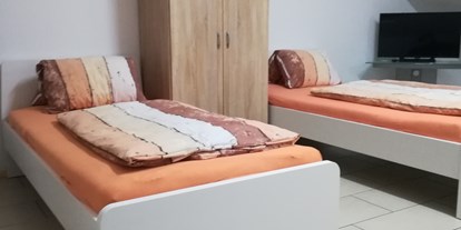 Monteurwohnung - Zimmertyp: Mehrbettzimmer - Adnet - Ferienwohnung 1 - Haus Schmeisser