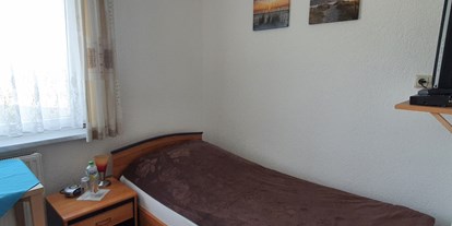 Monteurwohnung - Badezimmer: Gemeinschaftsbad - Alt Kätwin - Einzelzimmer Zimmer 1 - Pension Küstenkind 