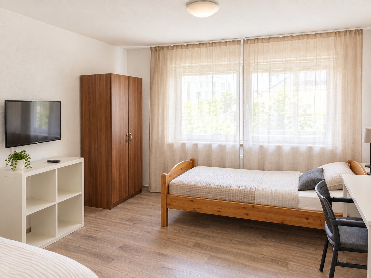 Monteurzimmer - Helles Doppelzimmer mit TV - Monteurzimmer Biblis
