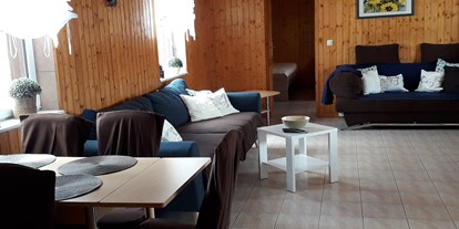 Monteurwohnung - Zimmertyp: Doppelzimmer - Hassel - Wohnzimmer - Ferienhaus Alter Melkstall 