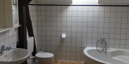 Monteurwohnung - Badezimmer: Gemeinschaftsbad - Gästehaus Mersch