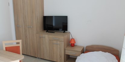 Monteurwohnung - Bettwäsche: Bettwäsche inklusive - Tamm - Beispiel eines unserer Zimmer - Millenium Boarding House