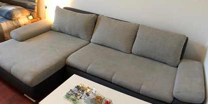 Monteurwohnung - Zimmertyp: Einzelzimmer - Graz und Umgebung - Couch der Monteurunterkunft in Graz. - Monteurzimmer/Monteurwohnung in Graz