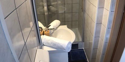 Monteurwohnung - Kaffeemaschine - Graz - Badezimmer mit WC in der Monteurwohnung in Graz. - Monteurzimmer/Monteurwohnung in Graz