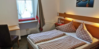 Monteurwohnung - WLAN - Hof (Wagrain) - Schlafzimmer Fewo - Ferienwohnung Saunahaus