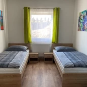 Monteurwohnung: Doppelzimmer mit Einzelbetten im Monteurzimmer in Neulengbach - Monteurzimmer-Buchen.at  in Neulengbach