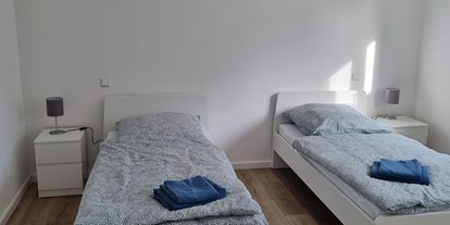 Monteurwohnung - Einzelbetten - Düsseldorf 017681033054 - Schlafzimmer - Monteurswohnung TAKAppartement Dormagen EG