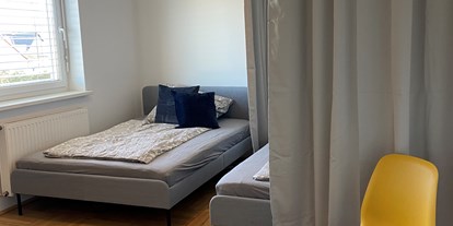 Monteurwohnung - TV - Kärnten - Schlafbereich in der Monteurunterkunft in Klagenfurt-Viktring - Zimmer/Apartments für Monteure 9020 Klagenfurt