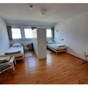 Monteurwohnung: Schlafzimmer 1 - Business Apartment Aida, 6 Personen, Einzelbetten