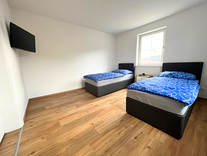 Monteurwohnung - Bettwäsche: Bettwäsche inklusive - Vordernberg - Zimmer Übersicht - Wochenzimmer - Premium Apartments für Monteure und Projektteams