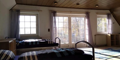 Monteurwohnung - Bettwäsche: Bettwäsche inklusive - Lastrup - Zimmer mit großem Balkon - Monteurunterkunft Lindern 