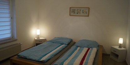 Monteurwohnung - Bettwäsche: Bettwäsche inklusive - Belsch - Schlafzimmer WG 1 im EG - Silke Maahn