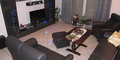 Monteurwohnung - Zimmertyp: Einzelzimmer - Luckaitztal - Wohnzimmer Sitzecke - Ferienhaus 