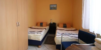 Monteurwohnung - Art der Unterkunft: Gästehaus - Calau - Schlafzimmer1 Parterre - Ferienhaus 
