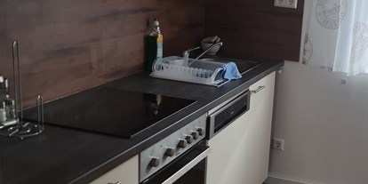 Monteurwohnung - Küche: eigene Küche - Muggensturm - Monteurzimmer Apartment am Bahnsteig