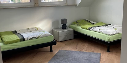 Monteurwohnung - Bettwäsche: Bettwäsche inklusive - PLZ 56242 (Deutschland) - Schlafzimmer Obergeschoss  - Monteurzimmer Monteurwohnung