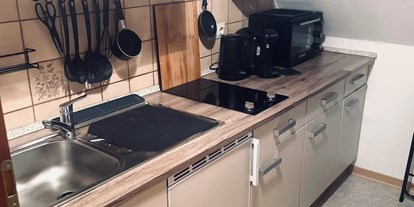 Monteurwohnung - Kühlschrank - PLZ 31008 (Deutschland) - Küche - Dachnest City Apartment